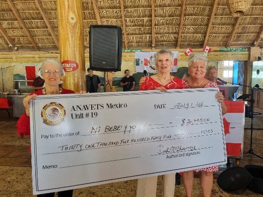 ANAVETS cheque presentation to Mi Bebé Y Yo at Canada Day 2026